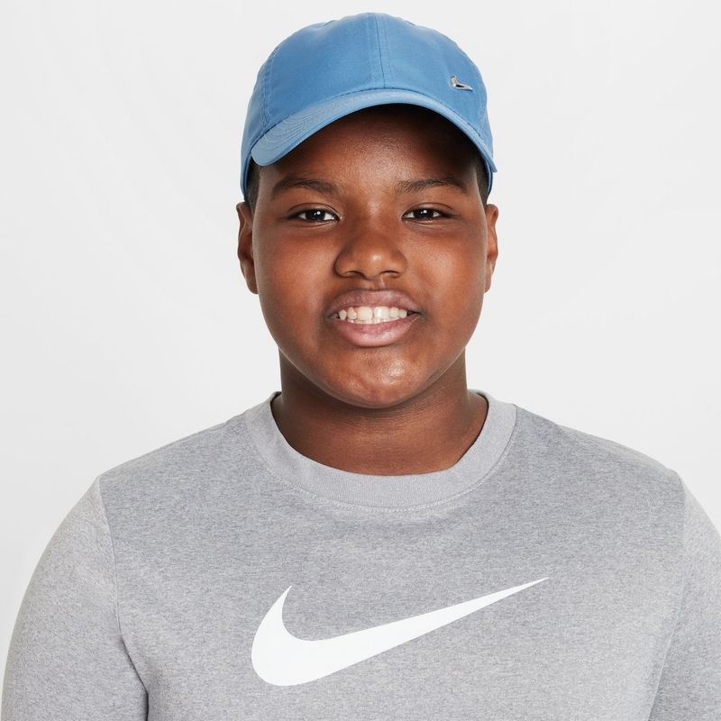 Metal swoosh cap store
