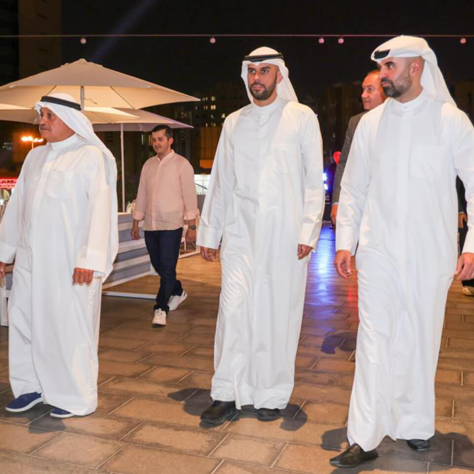 Team of volunteers working together to clean up desert area